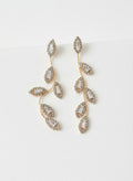 Gold leaf branch earrings with simulated diamonds on white