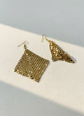 Gold sequin diamond-shape earrings on white