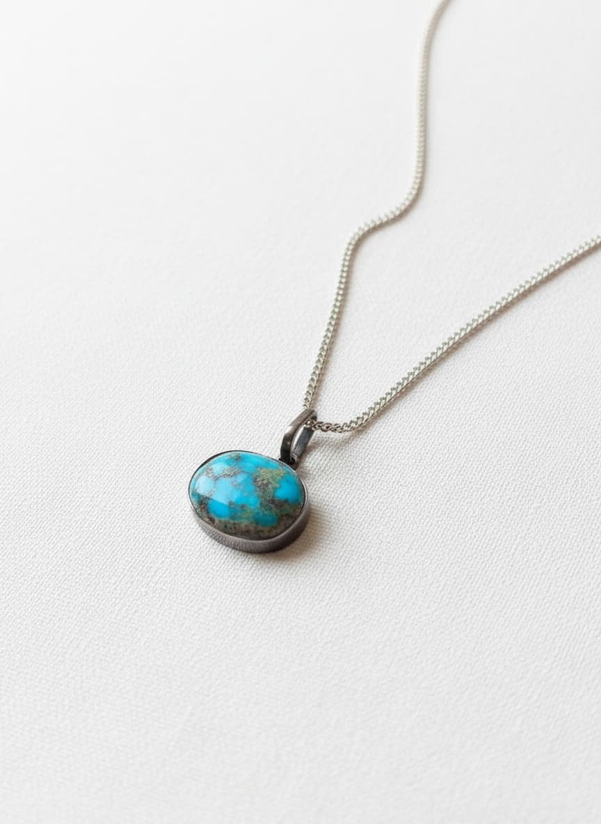 Silver turquoise pendant necklace on white