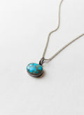 Silver turquoise pendant necklace on white