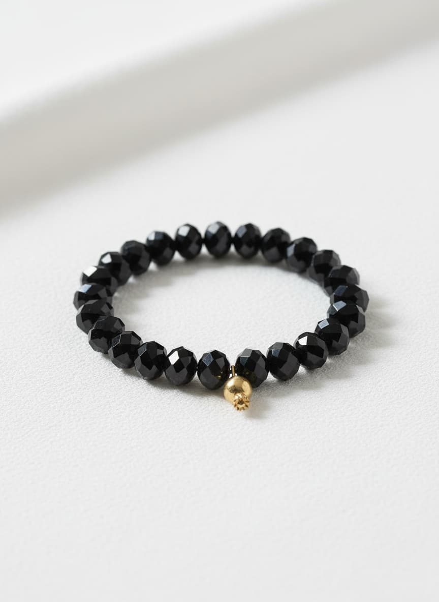 Black Czech Glass Bead Bracelet with Brass Pomegranate