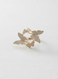 Gold-plated butterfly ring with stones on white