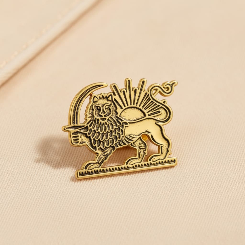 Close-up of the gold lion and sun brooch