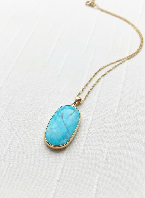 14k gold-plated turquoise pendant necklace on white