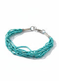 Silver-tone Persian calligraphy bracelet with turquoise beads on white