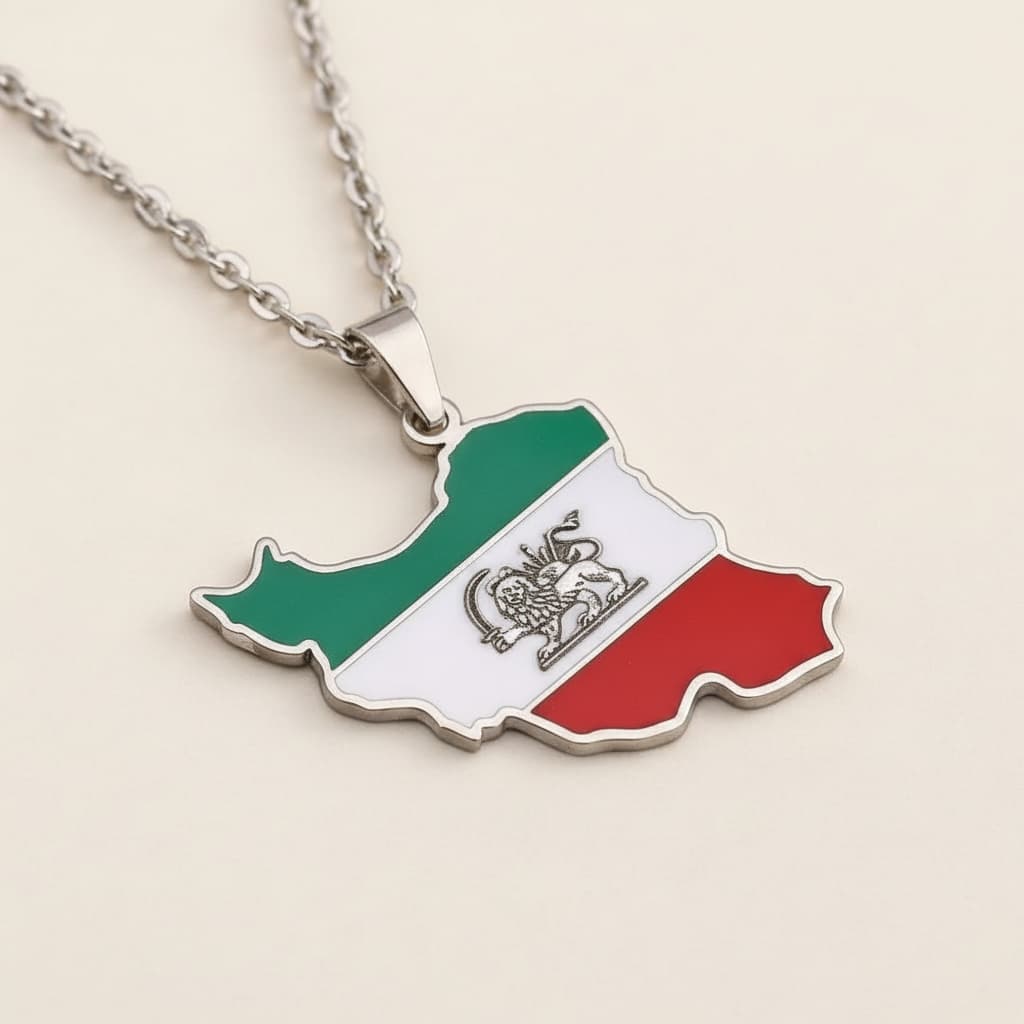 Silver-tone Iran map pendant with lion-and-sun emblem, macro close-up