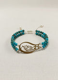 Gold Persian calligraphy bracelet with turquoise beads