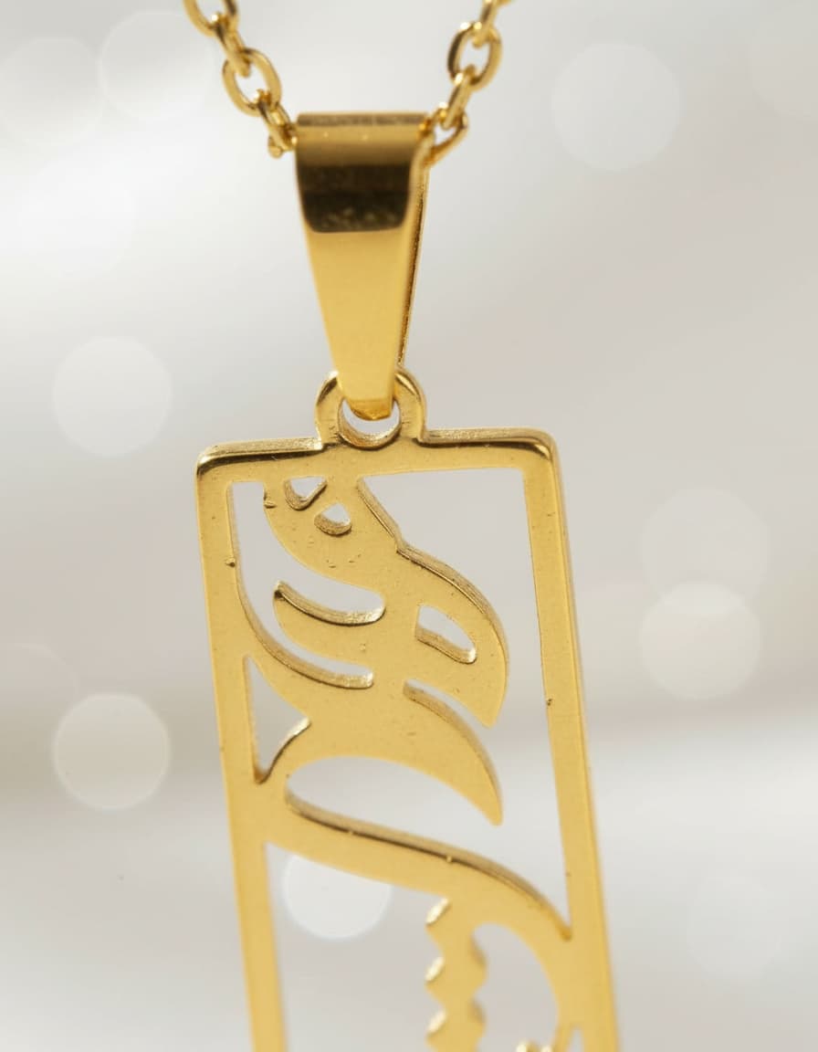 Macro close-up of the rectangle calligraphy pendant