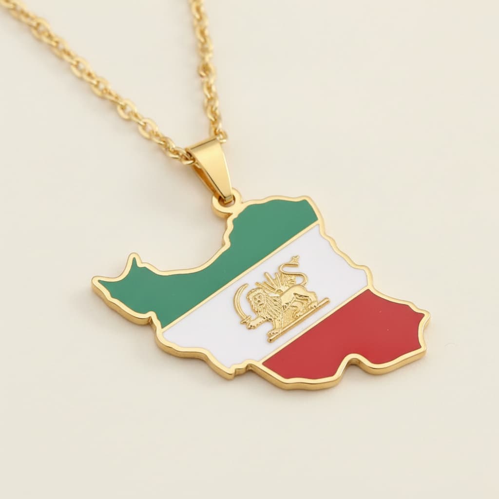 Gold-plated Iran map pendant with lion-and-sun emblem, macro close-up