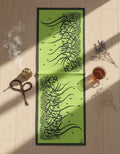 Green velvet runner with black Persian calligraphy
