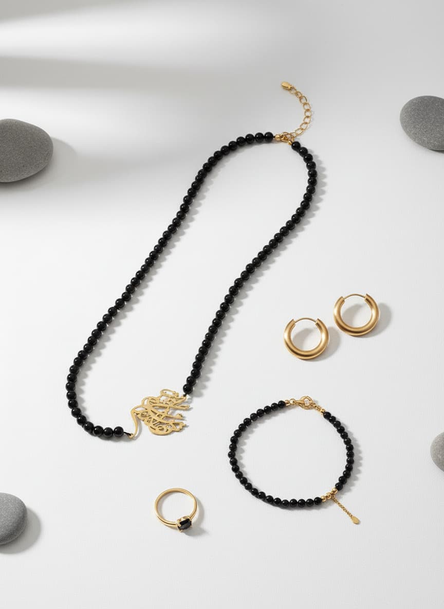 Gold-Plated Calligraphy Side Necklace with Onyx Beads by Adrissa Design — view 2