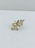 Gold leaf vine ring on white background