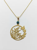 Gold butterfly poem necklace with green stone