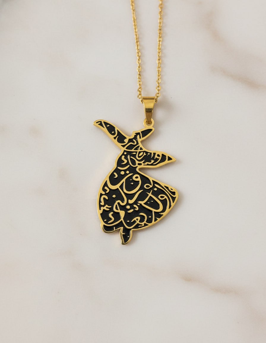 Gold-plated whirling dervish pendant necklace with black enamel and Farsi calligraphy
