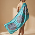 Teal silk scarf with ornate Persian tile medallion print