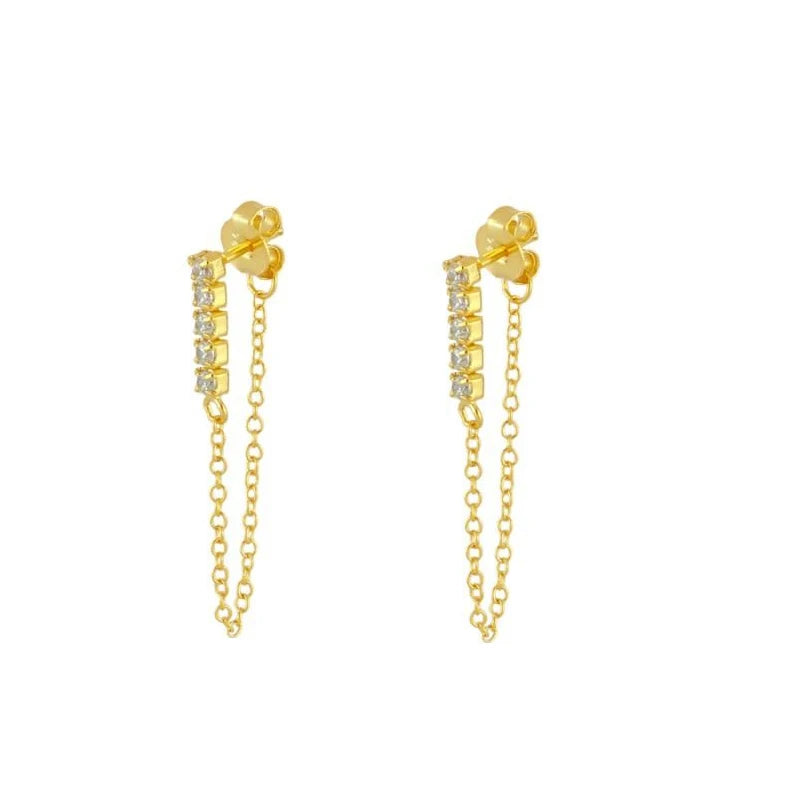 Gold earrings with chain details on a white background