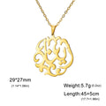 Gold necklace with an intricate pendant on a white background