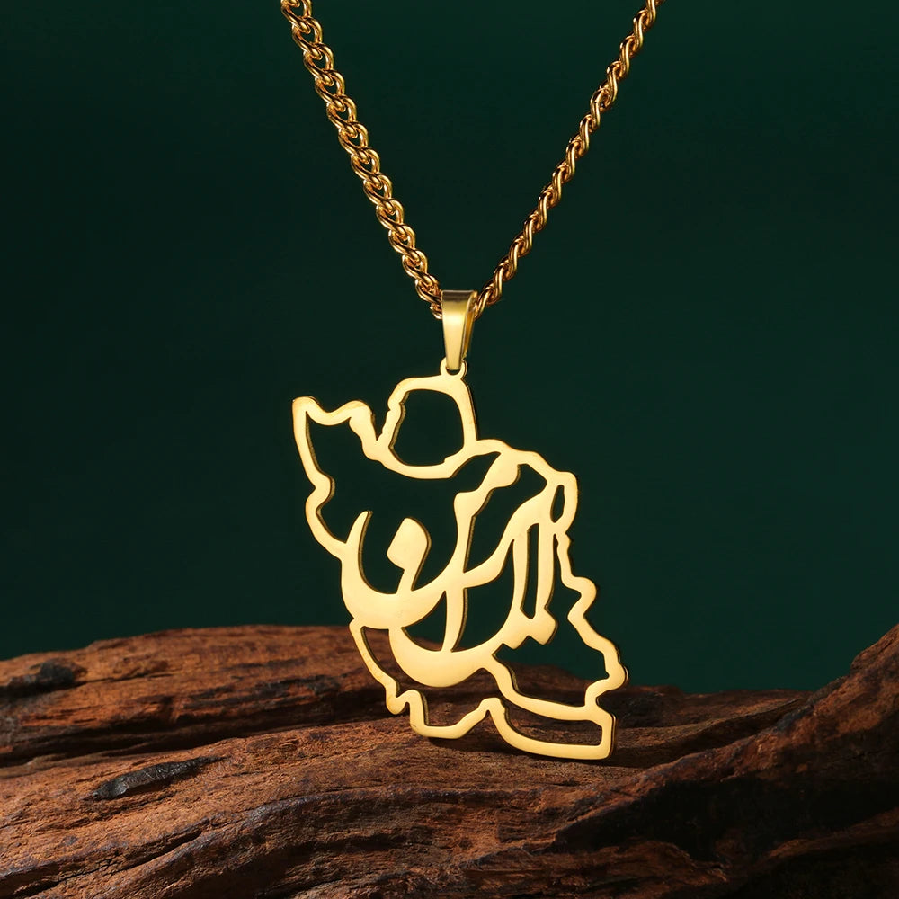 A gold-toned necklace with a cutout pendant shaped like the outline of Iran, resting on a piece of dark wood against a dark green background.