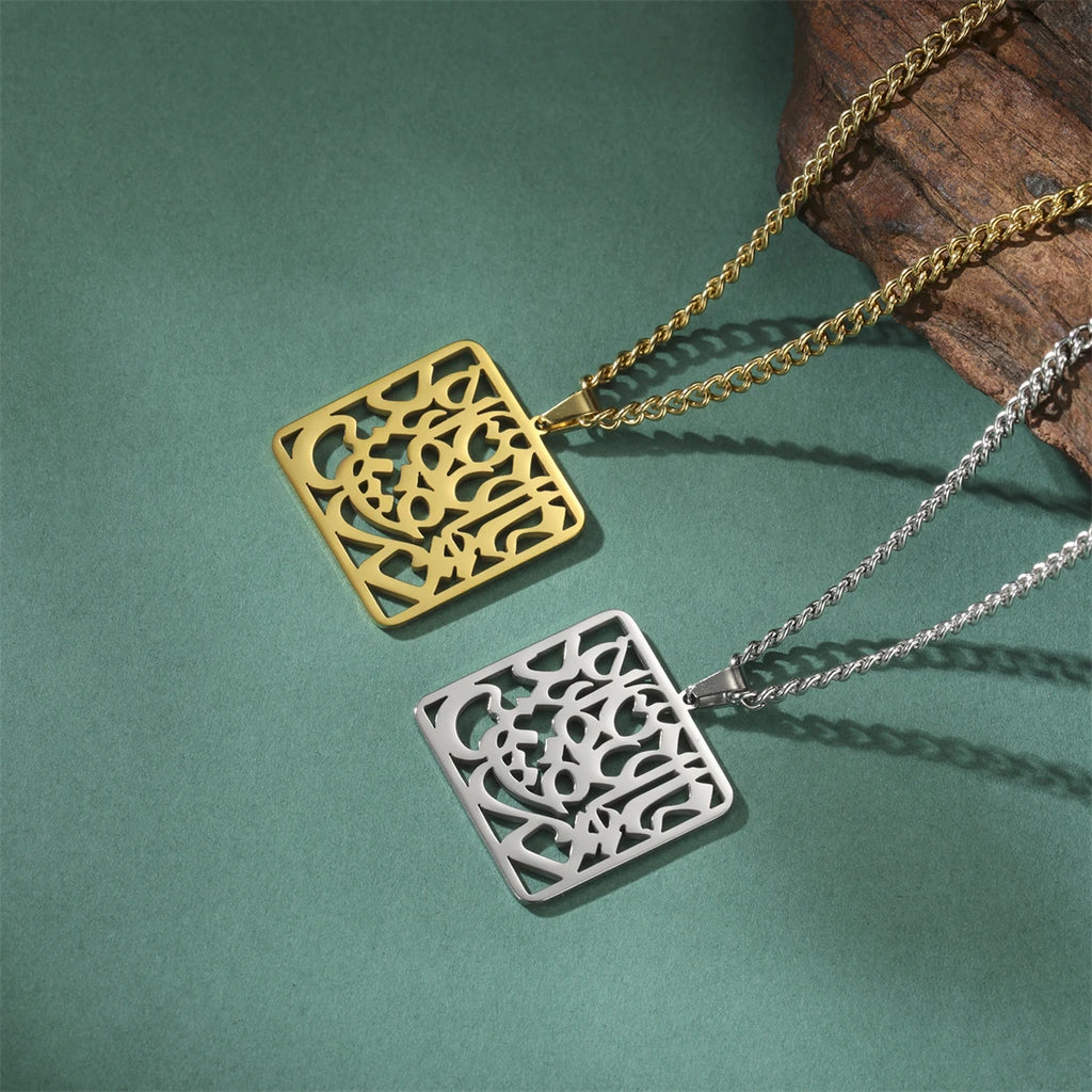 Gold and silver square pendants on chains against a green background