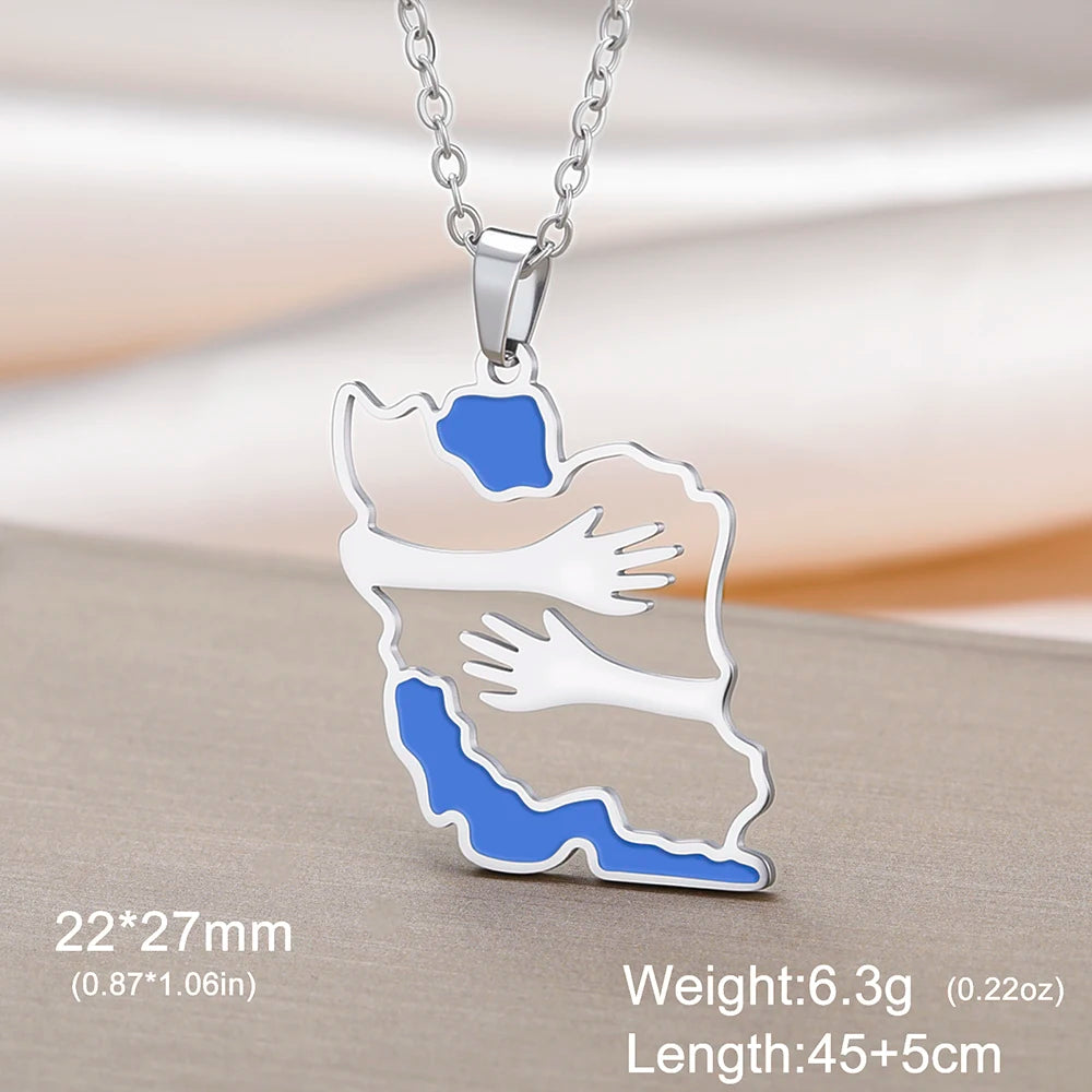 Silver-tone pendant necklace featuring a map outline of Bosnia and Herzegovina with blue inlaid regions and white hand motifs, shown on a chain against a soft beige background with size and weight text overlays.