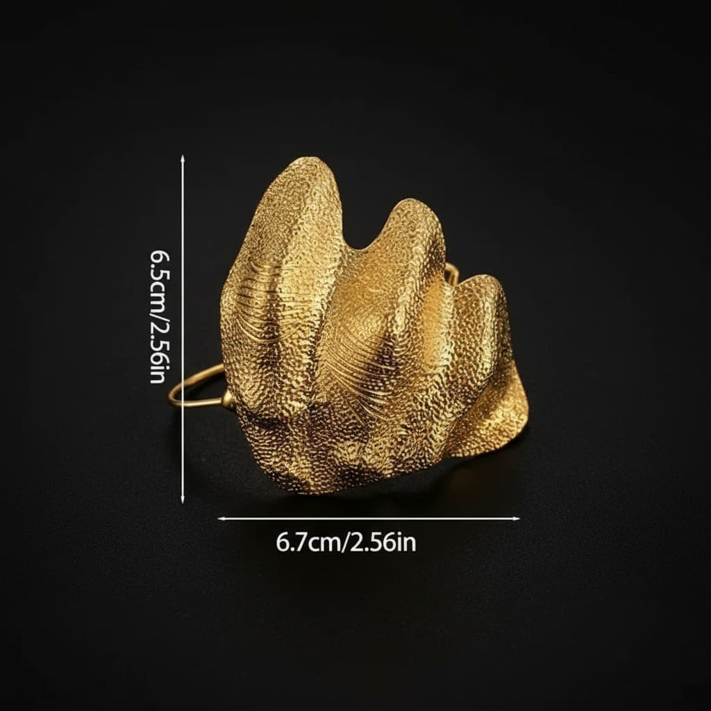 Gold-plated hammered statement ring with dimensions 6.5 by 6.7 cm