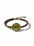 Persian calligraphy leather bracelet with golden medallion on white