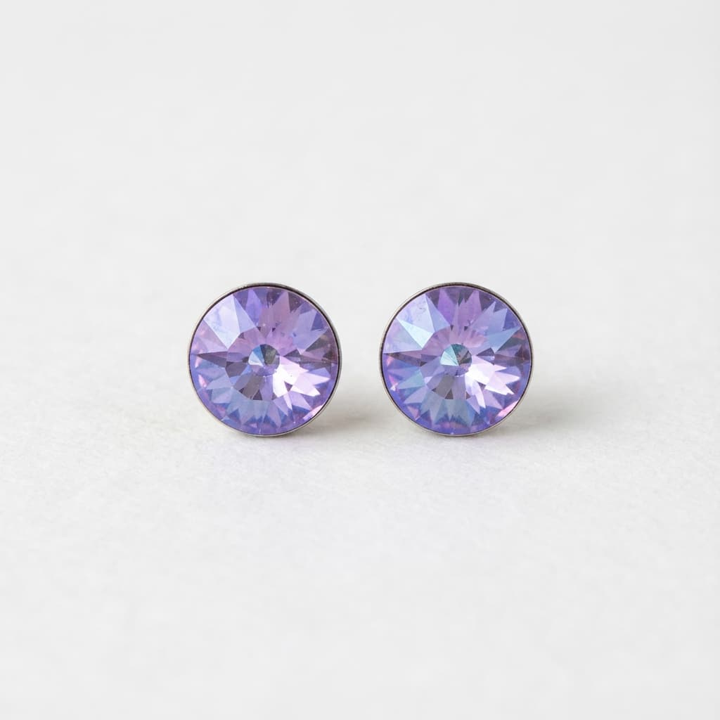 Lavender crystal stud earrings on white background
