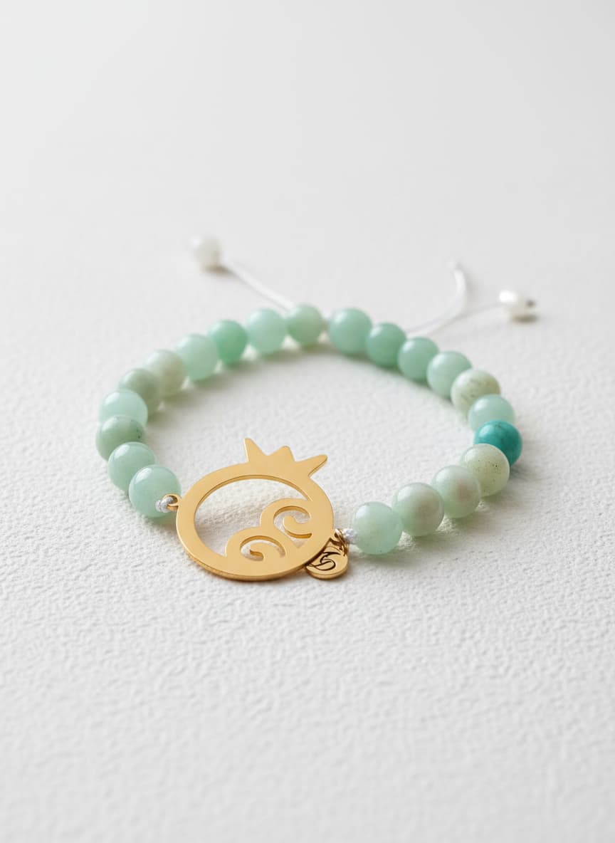 Gold-plated Persian calligraphy pomegranate bracelet on white