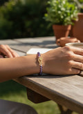 Gold-plated Persian calligraphy bird bracelet with amethyst on white