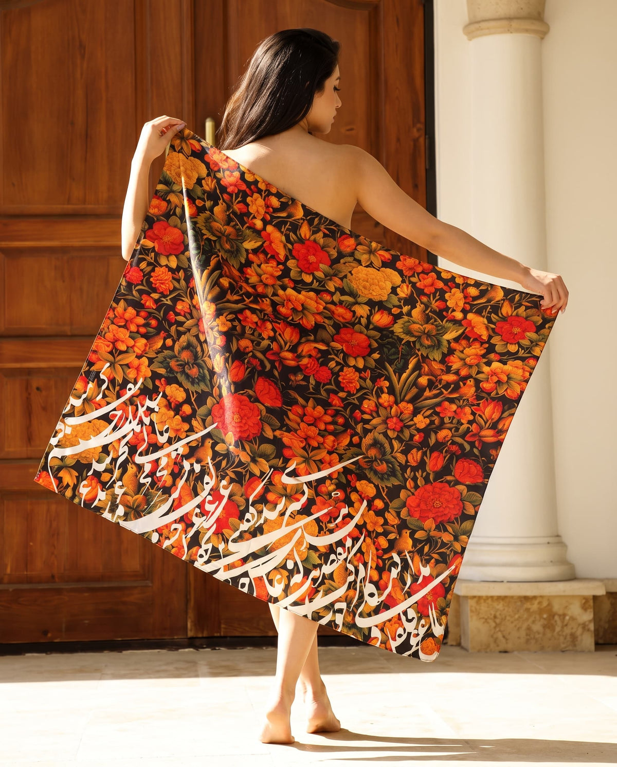 Black shawl with white Persian calligraphy and orange florals