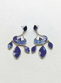 Silver-plated blue fabric chandelier earrings on white