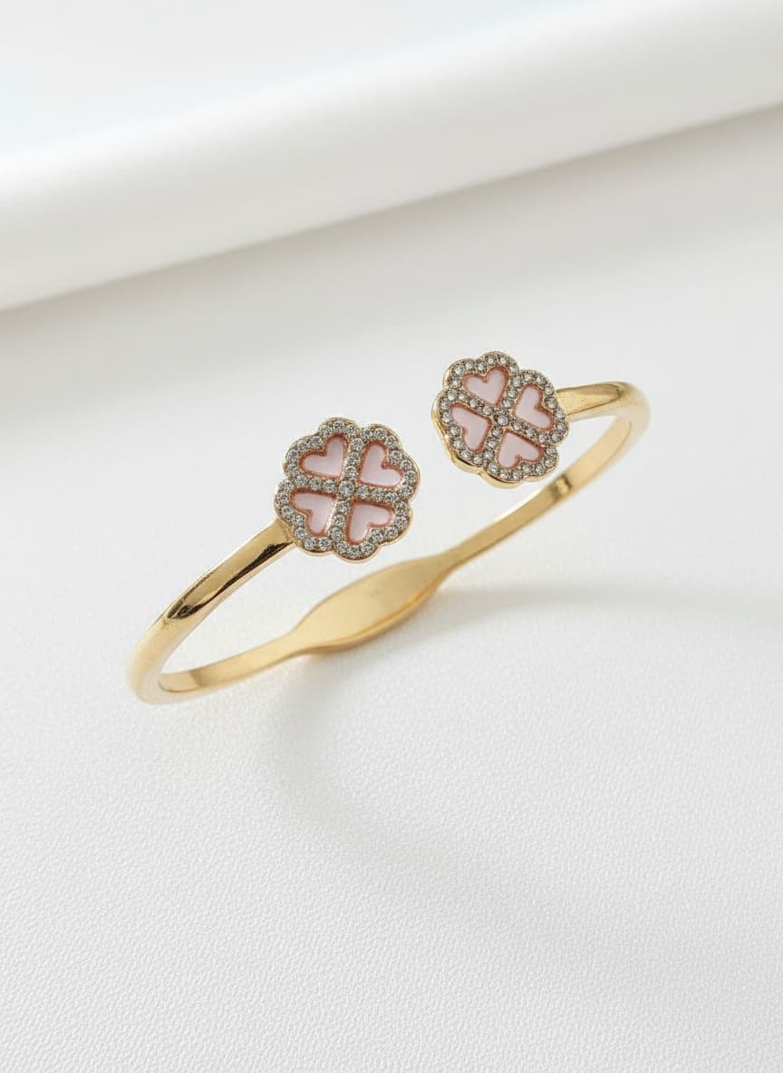 14k gold-plated floral bangle with artificial diamonds on white
