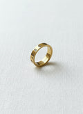 Gold-plated ring with Persian number engraving on white