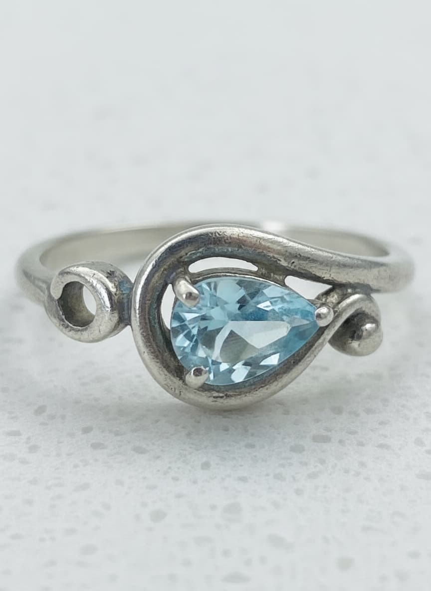 Macro close-up of the pear-cut sky-blue stone