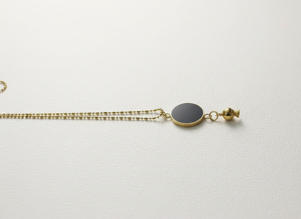 Brass-Plated Persian Style Pomegranate Necklace with Black Enamel Disc