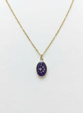 Gold necklace with purple amethyst star pendant