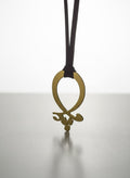 Gold Calligraphy Cord Necklace by Adrissa Design