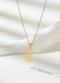 Gold Calligraphy Tag Necklace by Adrissa Design