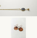 Pomegranate Gift Set — brass pomegranate necklace with black enamel disc and hammered copper disc earrings