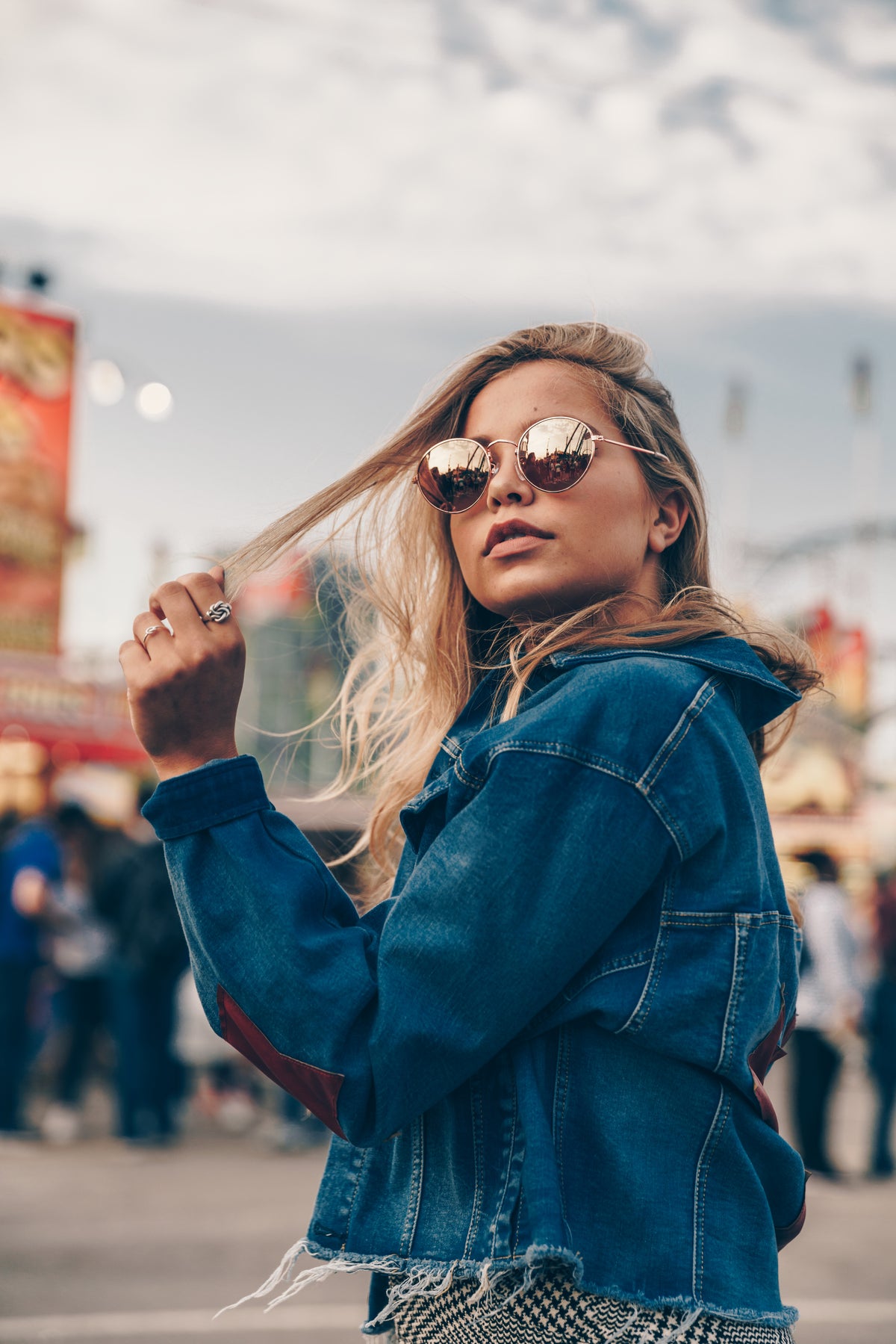 Woman playing with her blonde hair